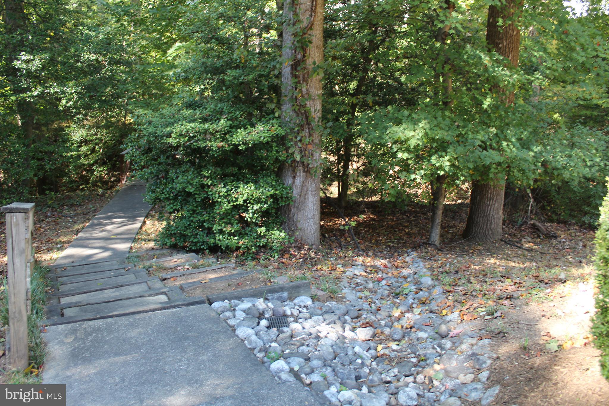 2346 Generation Drive Reston, VA 20191 - Photo 49 of 54 Stairs going over a bridge to the Reston paths