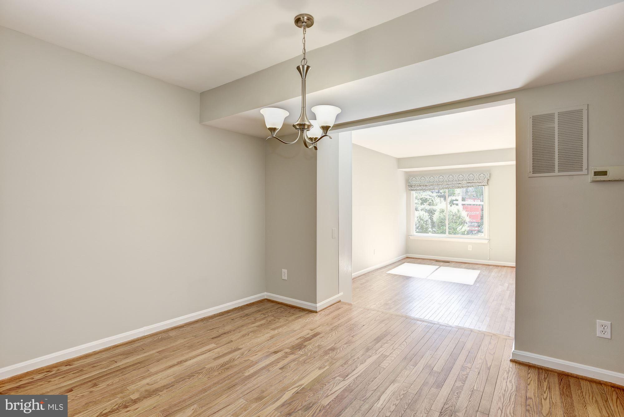 2346 Generation Drive Reston, VA 20191 - Photo 10 of 54 Step up dining room into Family room