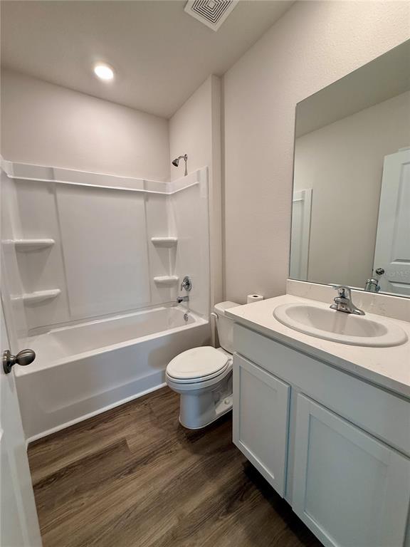 3222 Bitterroot Lane Bradenton, FL 34211 - Photo 26 of 34 a bathroom with a sink toilet and shower