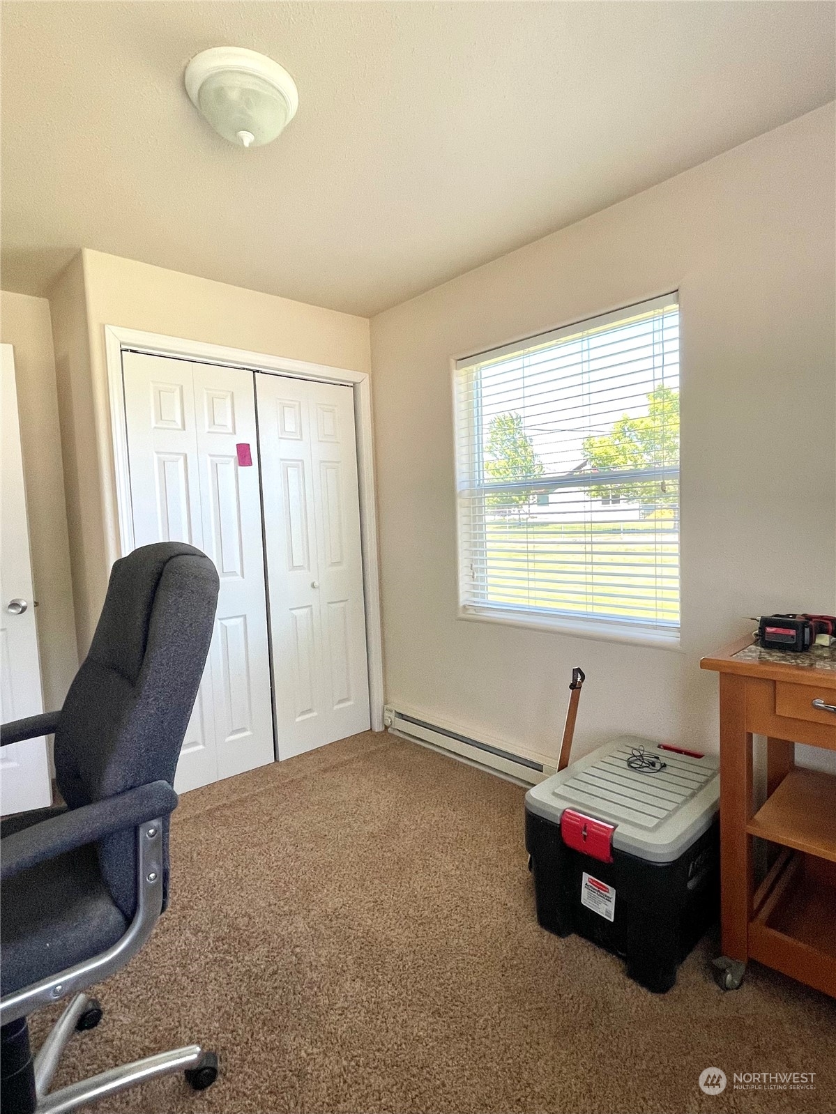 47 Kermel Road Omak, WA 98841 - Photo 17 of 40 a living room with furniture and a window