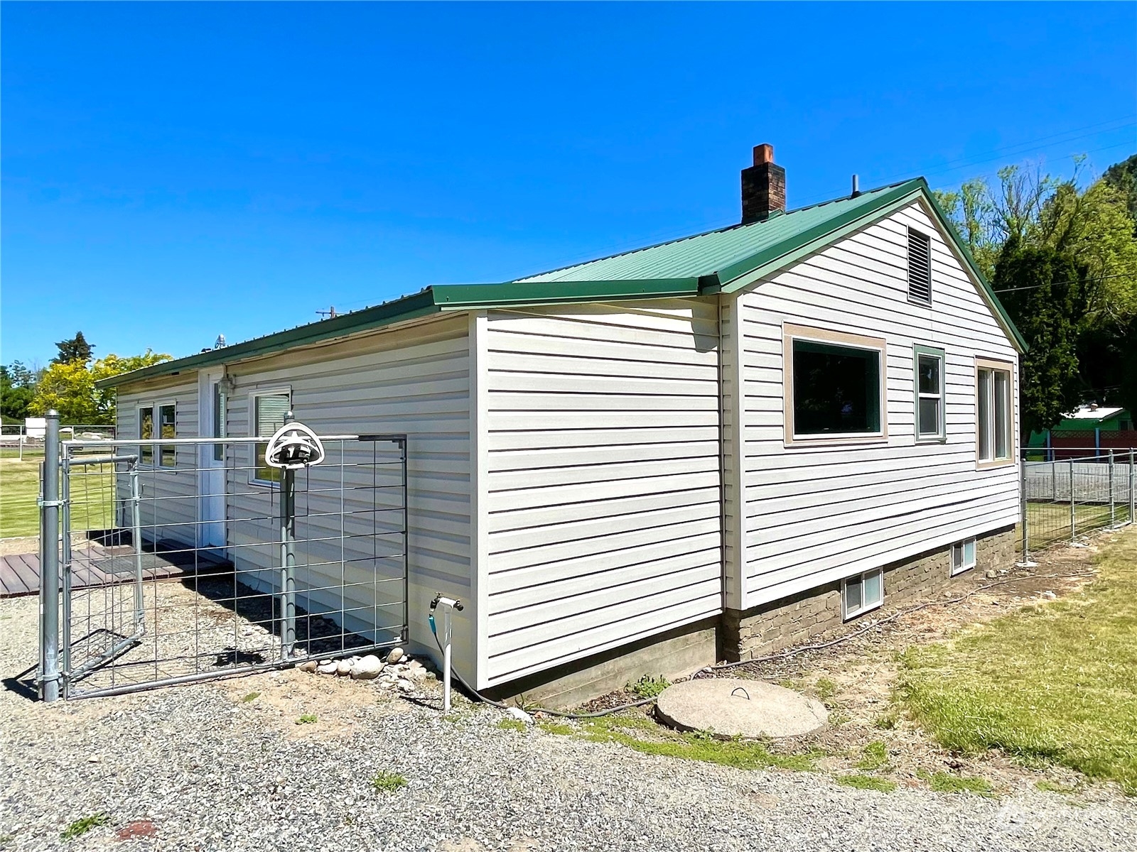 47 Kermel Road Omak, WA 98841 - Photo 2 of 40 a view of a house with a yard