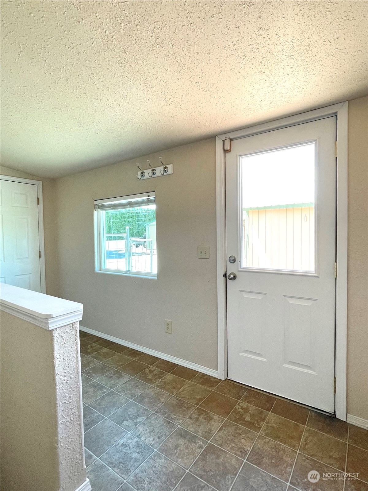 47 Kermel Road Omak, WA 98841 - Photo 21 of 40 an empty room with a window