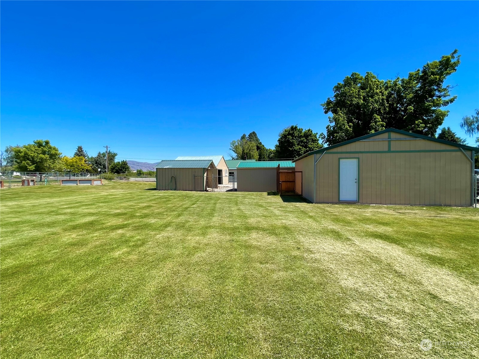 47 Kermel Road Omak, WA 98841 - Photo 26 of 40 a front view of a house with a yard