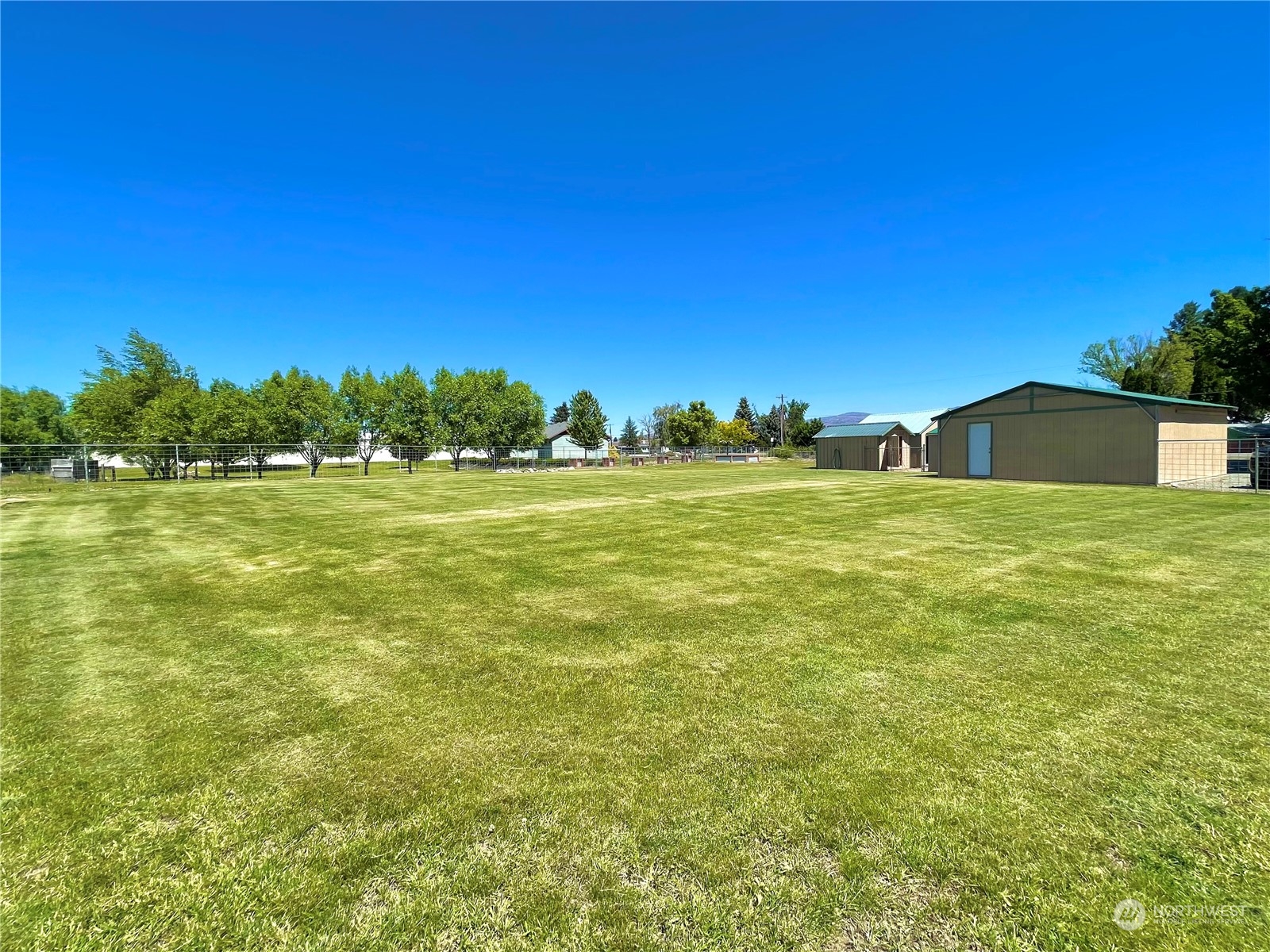 47 Kermel Road Omak, WA 98841 - Photo 29 of 40 a view of a pool with a yard