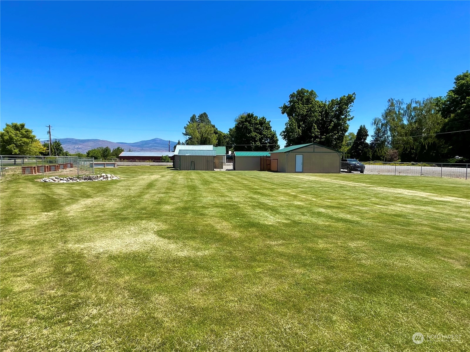 47 Kermel Road Omak, WA 98841 - Photo 30 of 40 a view of a swimming pool and an outdoor space