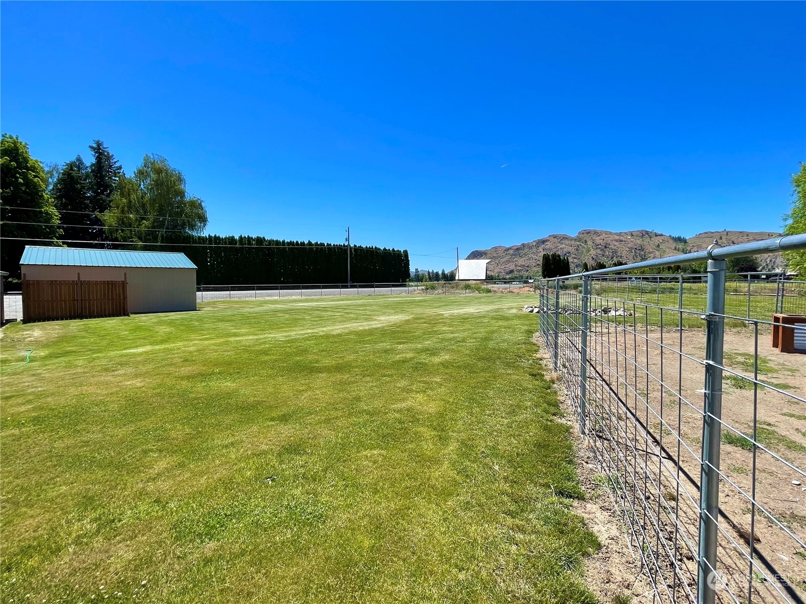 47 Kermel Road Omak, WA 98841 - Photo 31 of 40 a view of a swimming pool with a balcony