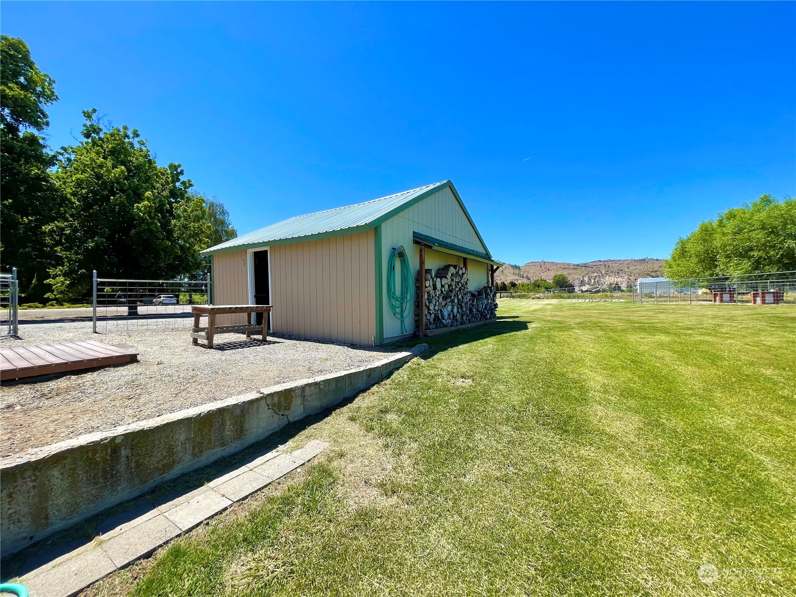 47 Kermel Road Omak, WA 98841 - Photo 33 of 40 a view of a house with a yard