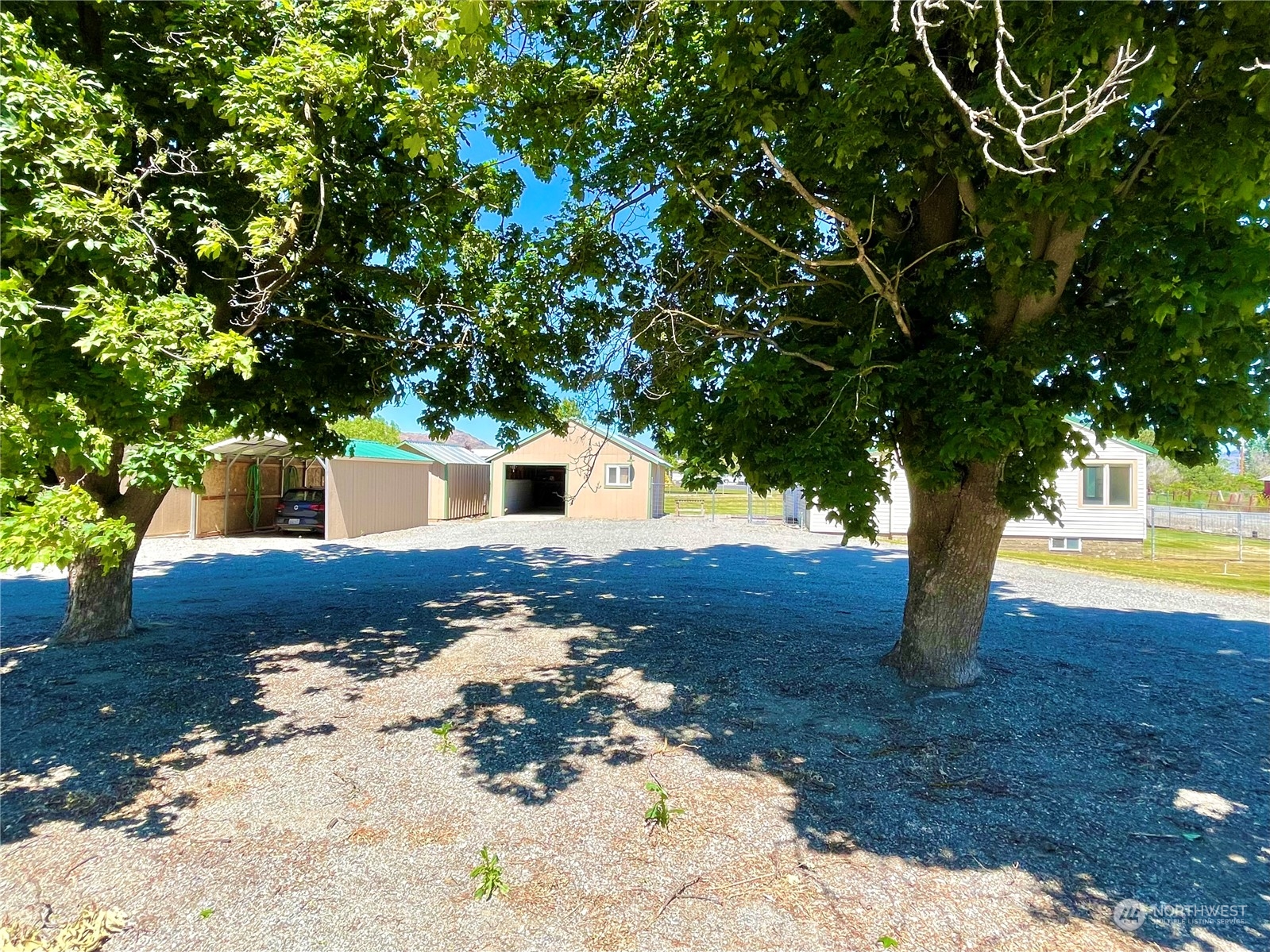 47 Kermel Road Omak, WA 98841 - Photo 35 of 40 a view of a yard with an tree