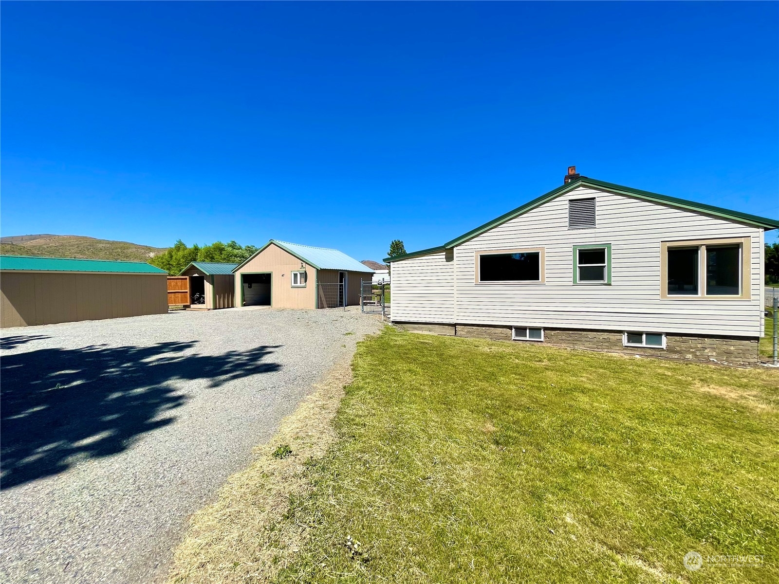 47 Kermel Road Omak, WA 98841 - Photo 40 of 40 a front view of a house with a yard