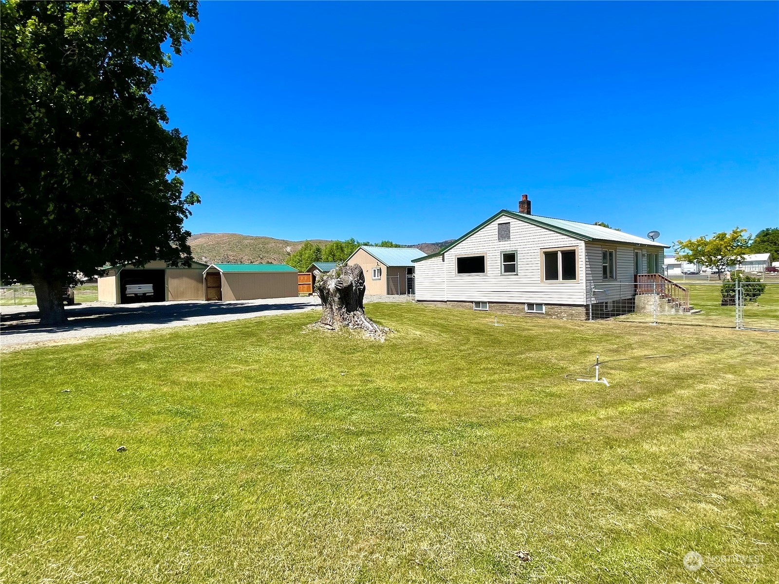 47 Kermel Road Omak, WA 98841 - Photo 4 of 40 a house view with swimming pool