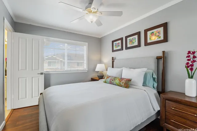 a bedroom with bed and window