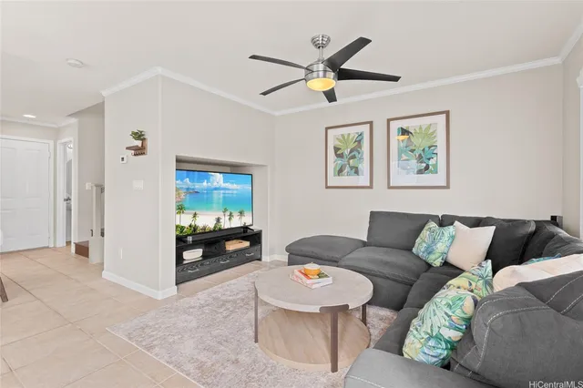 a living room with furniture and windows