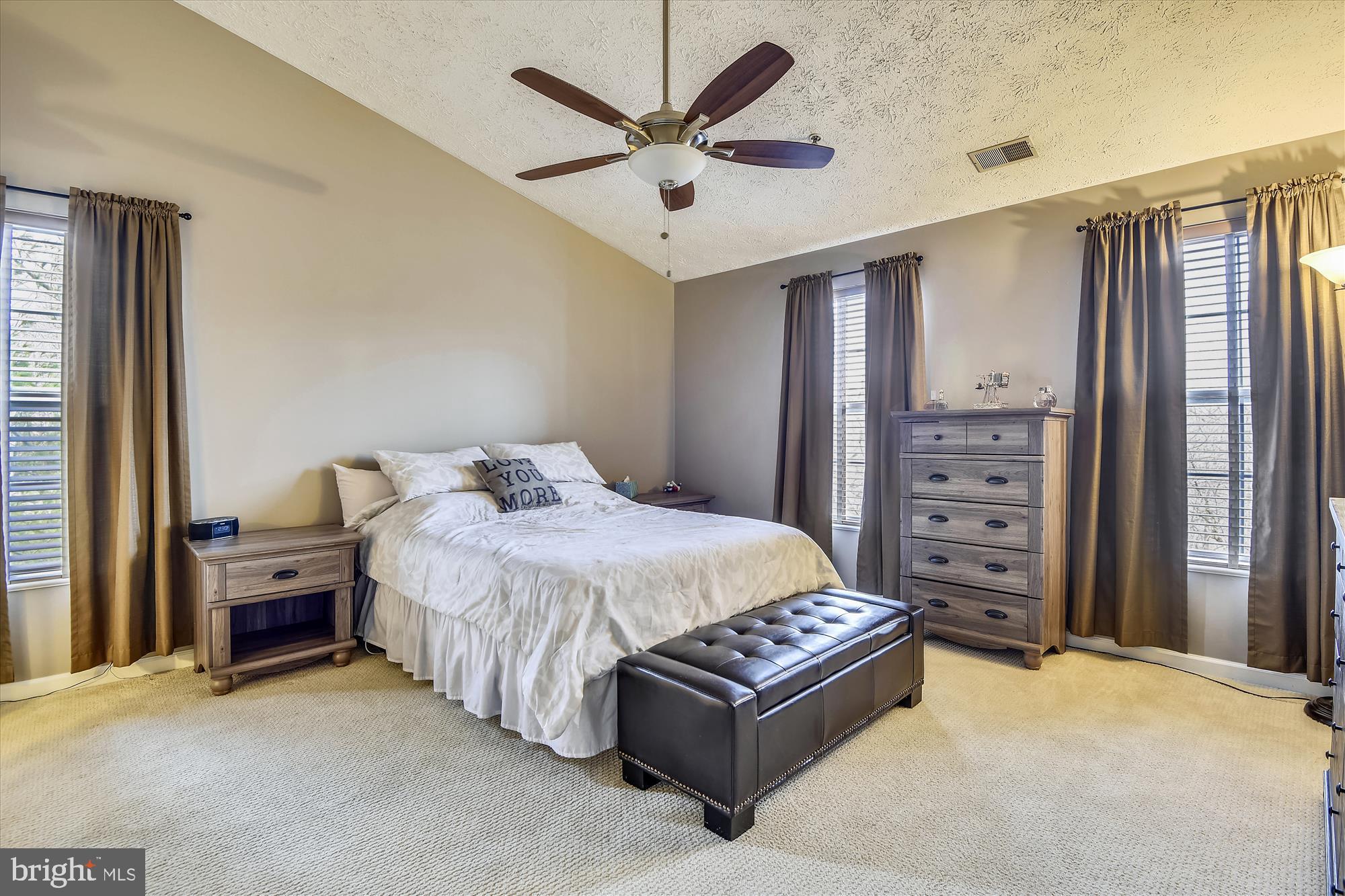 685 Winding Stream Way, Unit 302 Odenton, MD 21113 - Photo 14 of 38 Master bedroom with vaulted ceilings