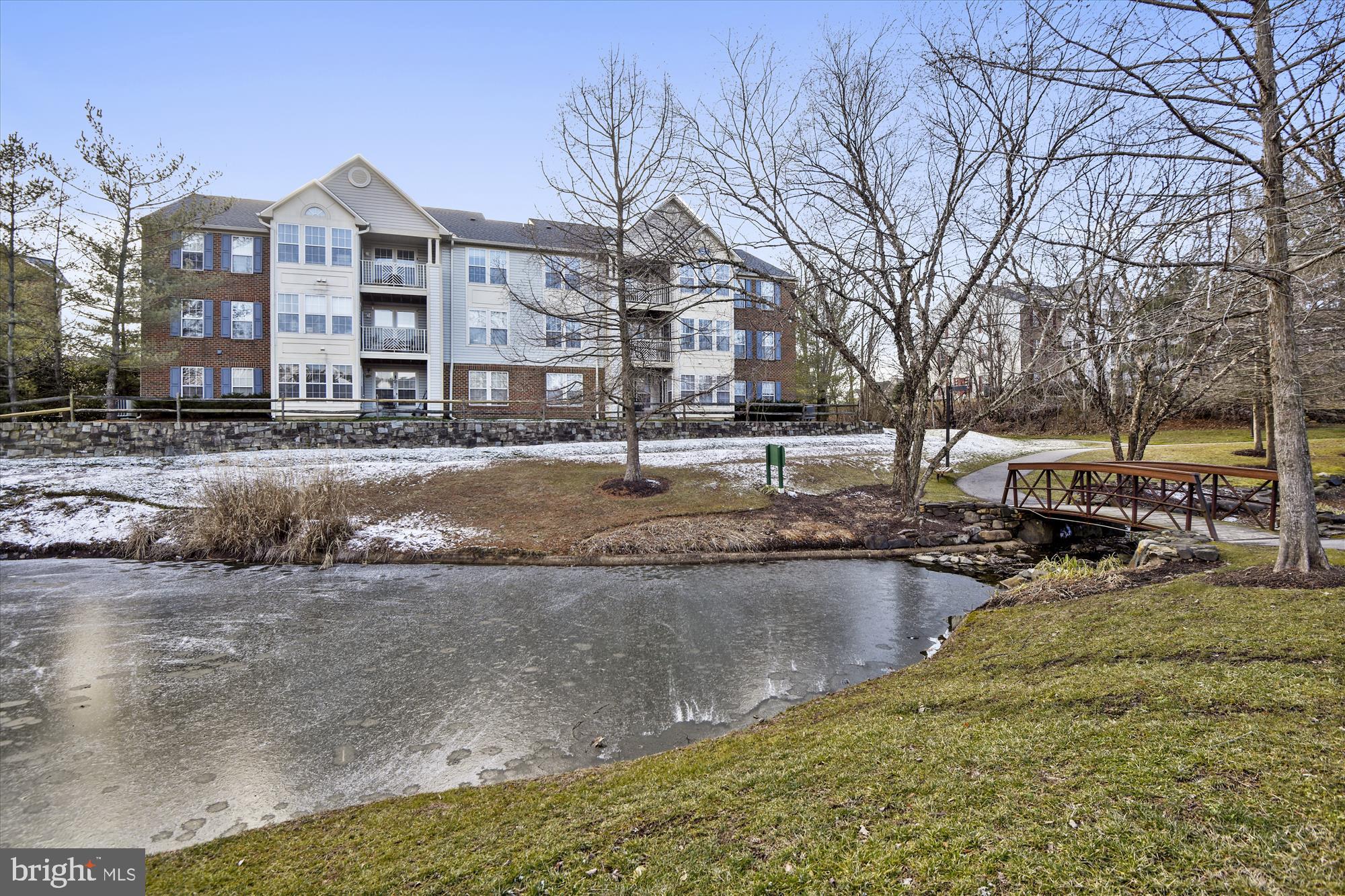 685 Winding Stream Way, Unit 302 Odenton, MD 21113 - Photo 20 of 38 Rear of building pond view