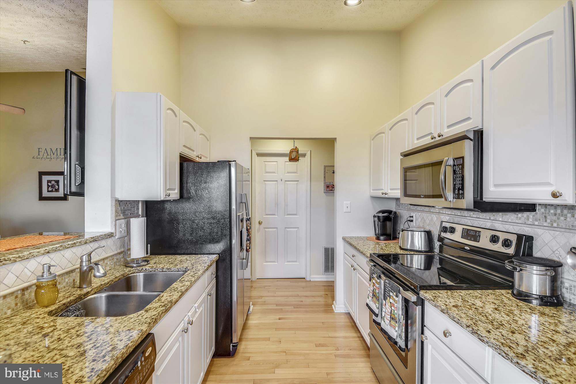 685 Winding Stream Way, Unit 302 Odenton, MD 21113 - Photo 8 of 38 Kitchen granite counter-tops and stainless appl.