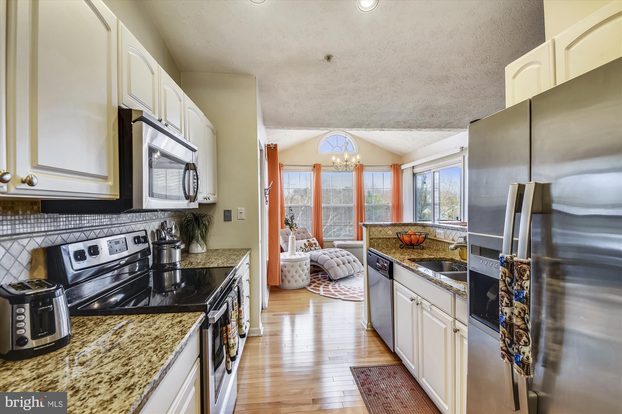 685 Winding Stream Way, Unit 302 Odenton, MD 21113 - Photo 10 of 38 Kitchen to sunroom