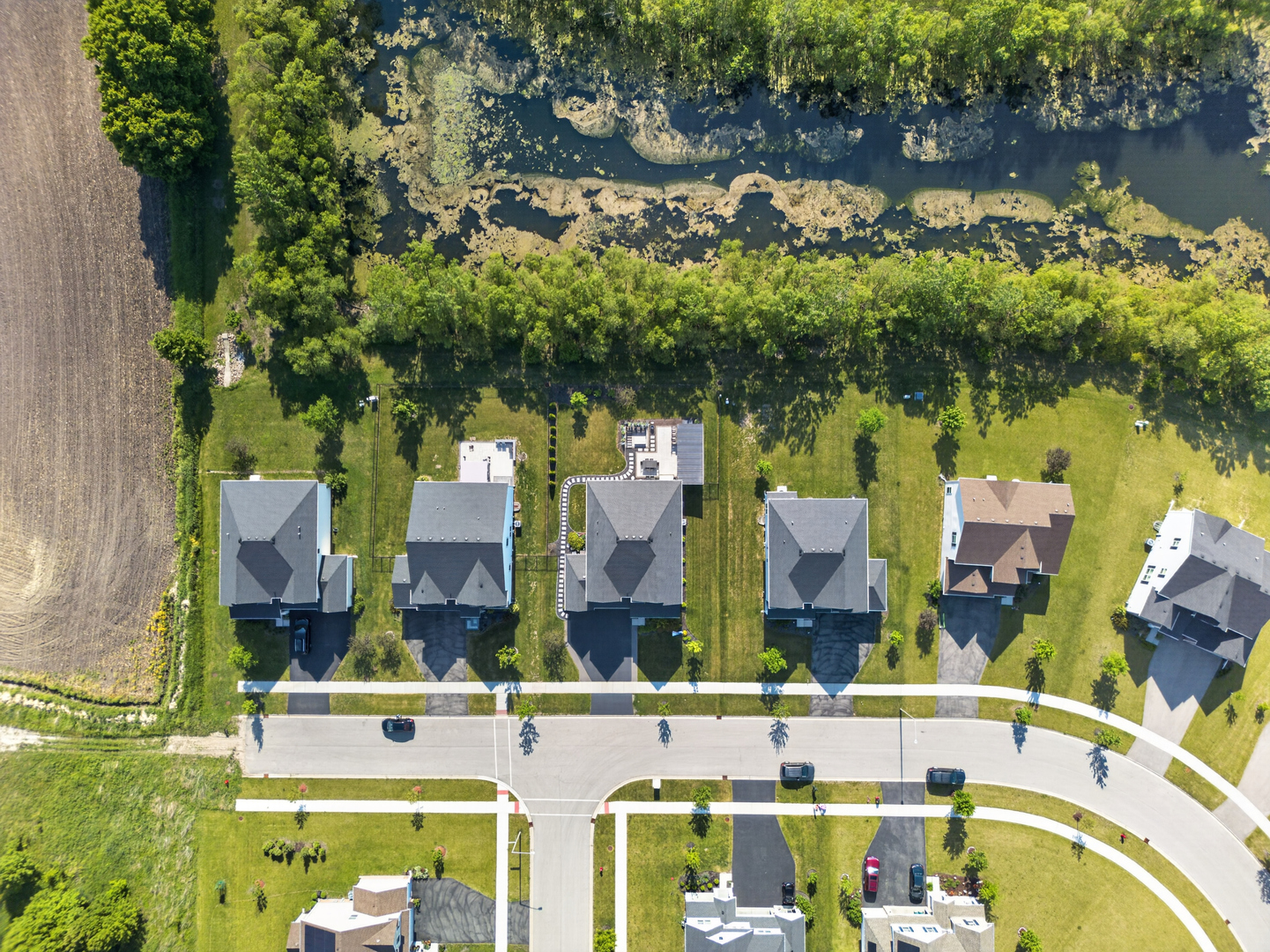 16230 Lake View Road Plainfield, IL 60586 - Photo 5 of 62 an aerial view of residential houses with outdoor space and lake view