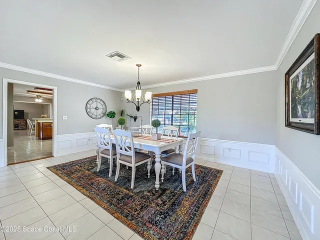 a kitchen with stainless steel appliances granite countertop a stove sink and cabinets
