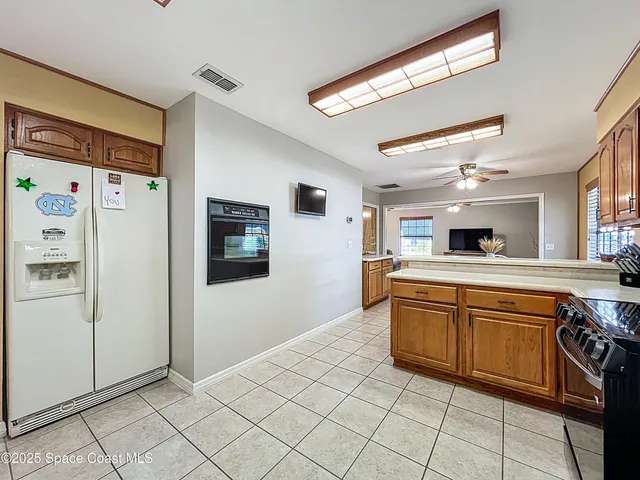 a bathroom with a sink toilet and a mirror