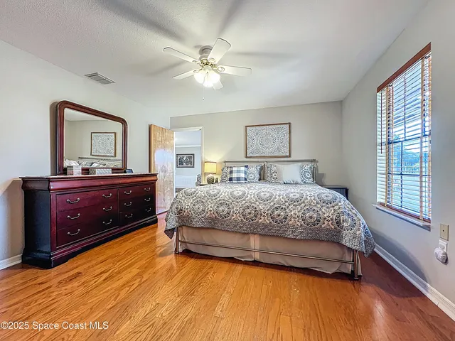 a view of a workspace with furniture and gym equipment