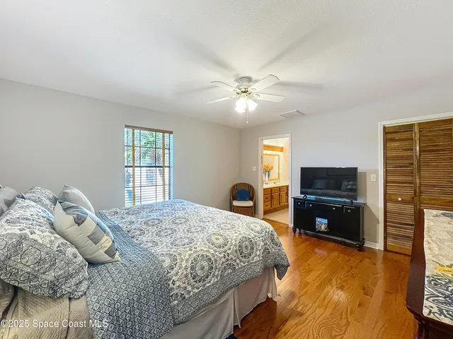 a view of a workspace with furniture and gym equipment