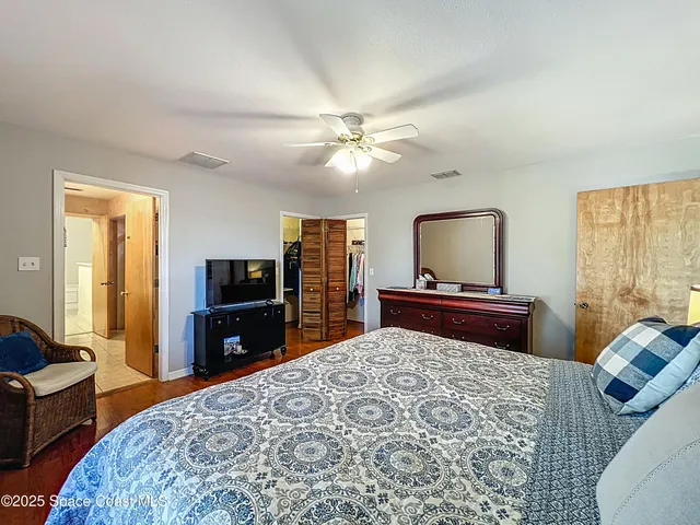 a utility room with cabinets dryer and washer