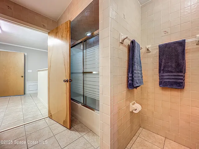 a view of a lake with a house in the background