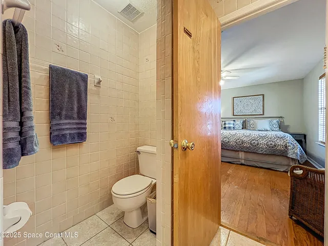 a view of a city with a ocean view