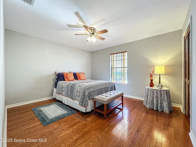an aerial view of residential houses with outdoor space and river