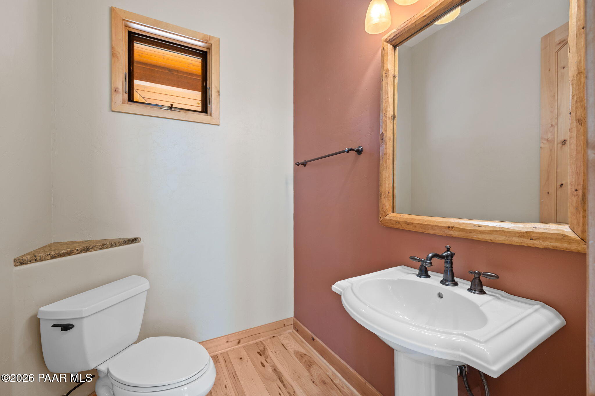 5140 East Charcoal Kiln Road Prescott, AZ 86303 - Photo 45 of 140 a bathroom with a sink mirror and toilet