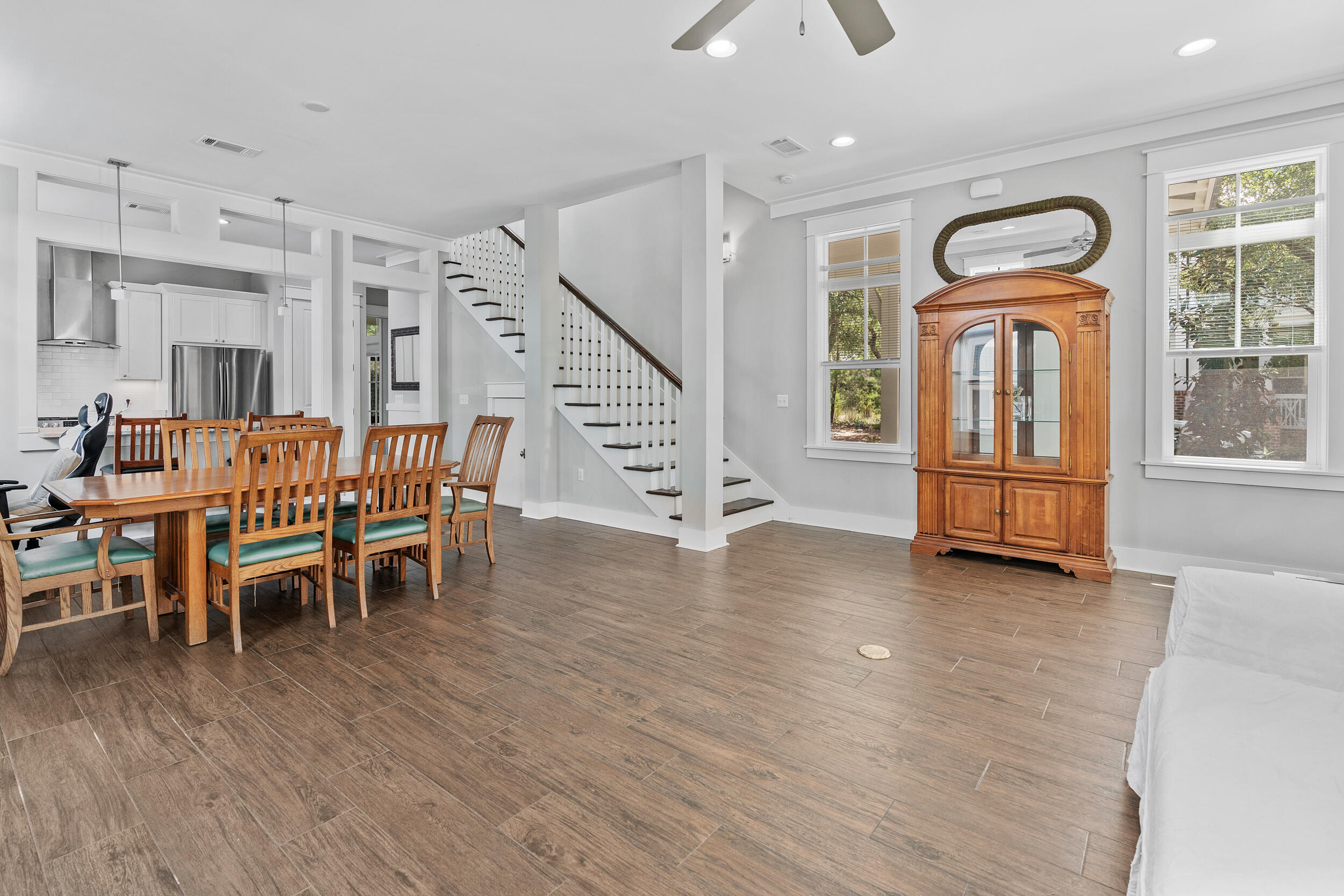 6 Pontchartrain South Santa Rosa Beach, FL 32459 - Photo 10 of 68 a view of a livingroom with furniture stairs wooden floor and windows