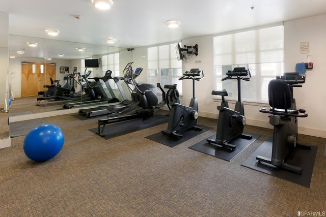 a view of a room with gym equipment