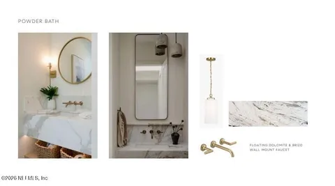 a bathroom with a sink mirror and vanity