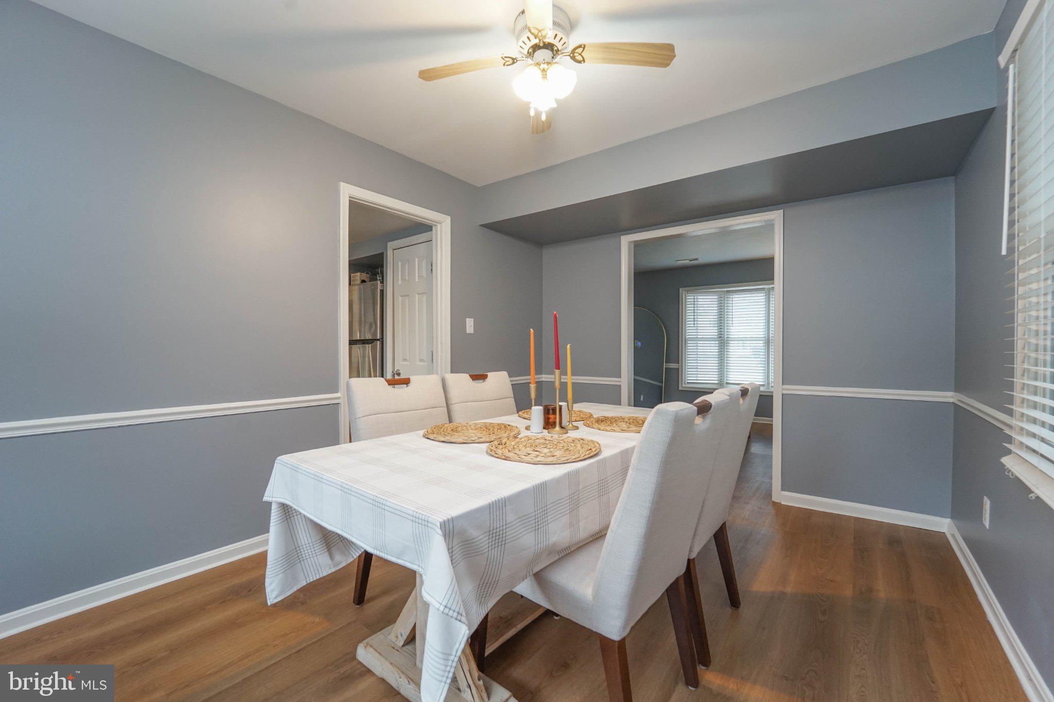 211 Queen Anne Road Stevensville, MD 21666 - Photo 15 of 33 Inviting dining space with soft hues.