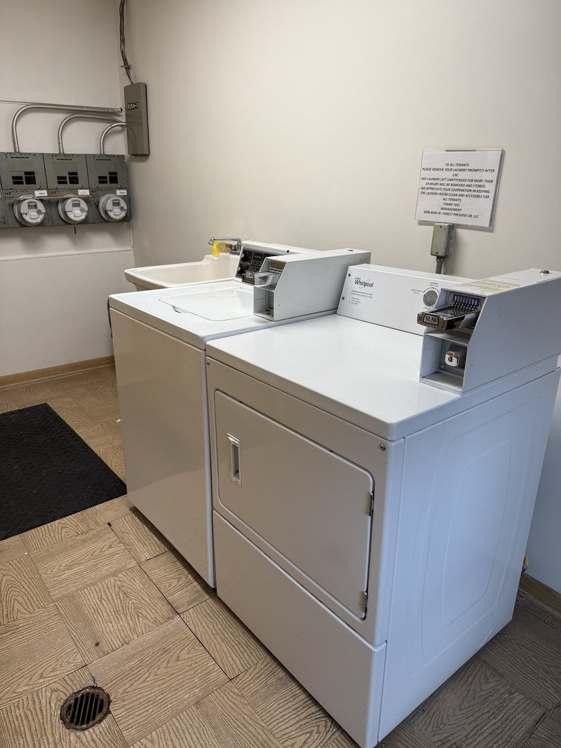 8304 W Forest, Unit 1W Chicago, IL 60634 - Photo 5 of 6 a utility room with dryer and washer