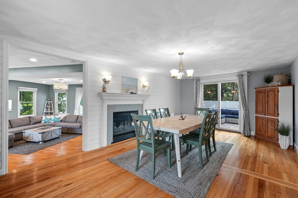 44 Peach Highlands Marblehead, MA 01945 - Photo 13 of 41 a view of a dining room with furniture window and wooden floor
