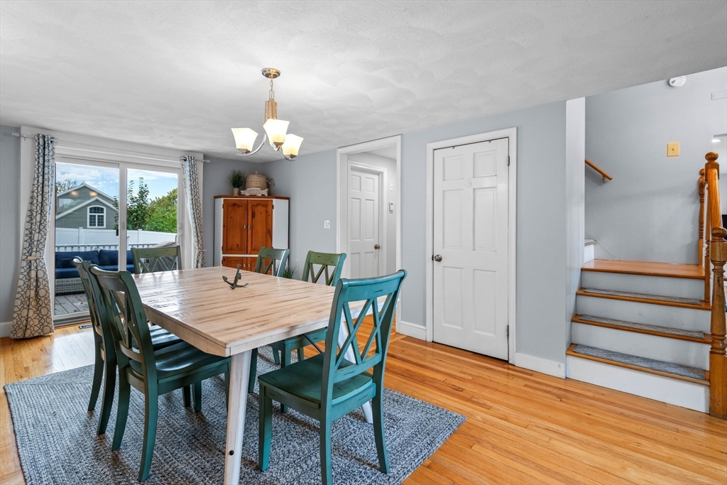 44 Peach Highlands Marblehead, MA 01945 - Photo 14 of 41 a view of a dining room with furniture window and wooden floor