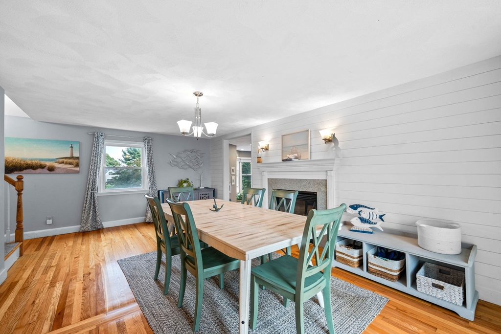 44 Peach Highlands Marblehead, MA 01945 - Photo 15 of 41 a view of a dining room with furniture and wooden floor