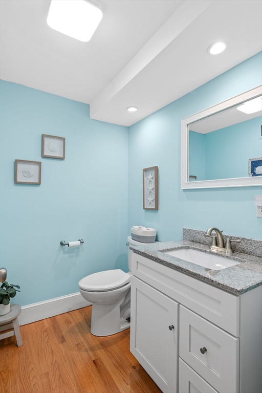 44 Peach Highlands Marblehead, MA 01945 - Photo 16 of 41 a bathroom with a granite countertop toilet sink and mirror