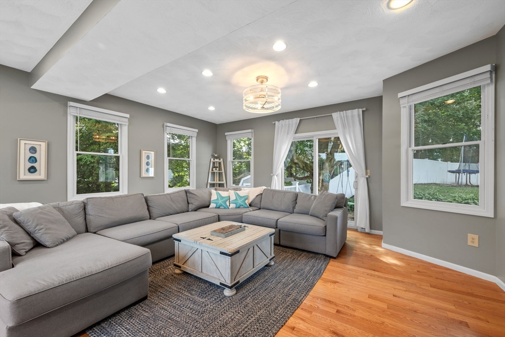 44 Peach Highlands Marblehead, MA 01945 - Photo 17 of 41 a living room with furniture and a large window