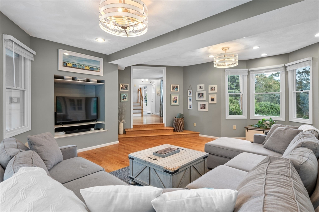 44 Peach Highlands Marblehead, MA 01945 - Photo 19 of 41 a living room with furniture and a large window