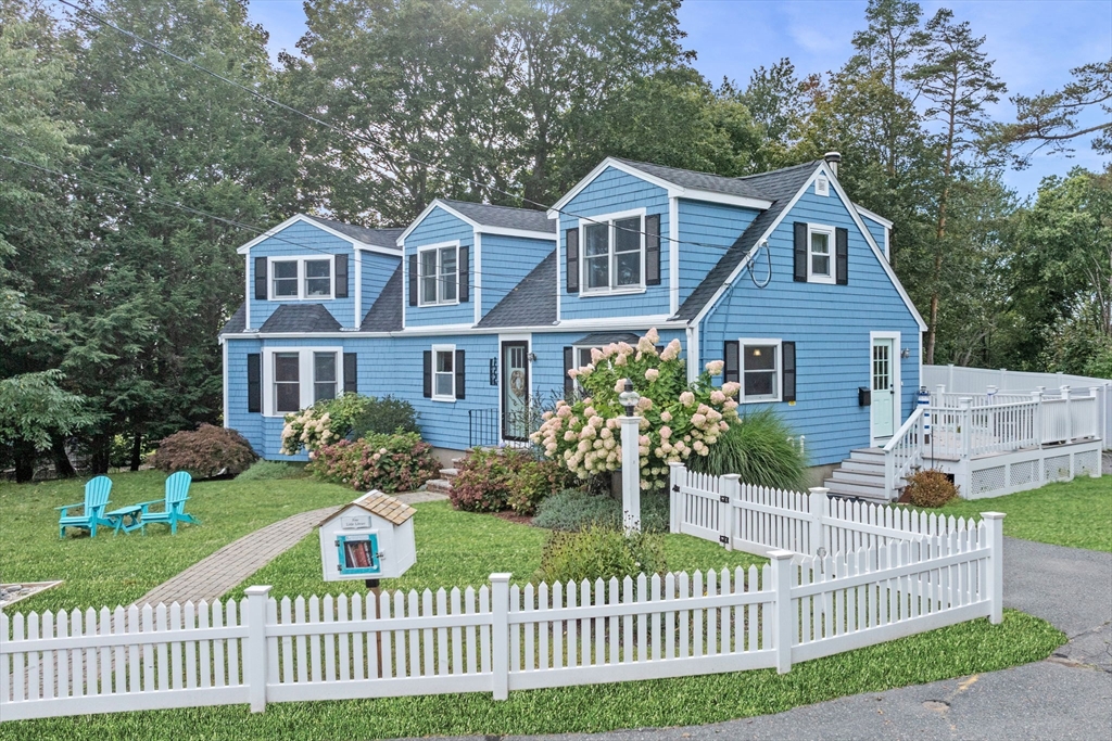 44 Peach Highlands Marblehead, MA 01945 - Photo 2 of 41 a front view of a house with a yard