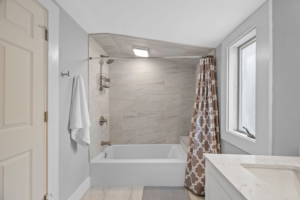 44 Peach Highlands Marblehead, MA 01945 - Photo 25 of 41 a bathroom with a bathtub a sink and a shower