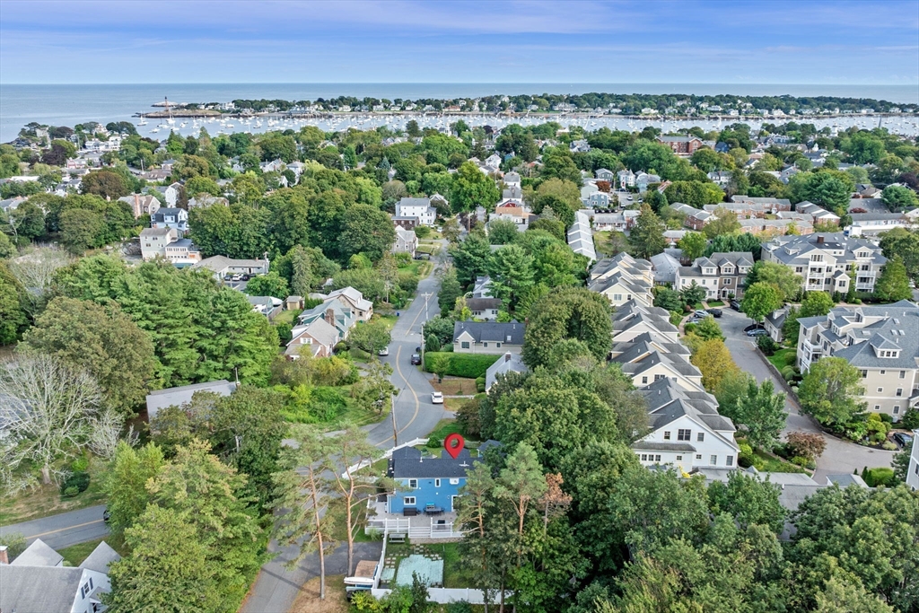 44 Peach Highlands Marblehead, MA 01945 - Photo 40 of 41 an aerial view of a city and lush green forest