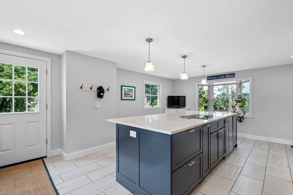 44 Peach Highlands Marblehead, MA 01945 - Photo 8 of 41 a kitchen with a sink and a refrigerator