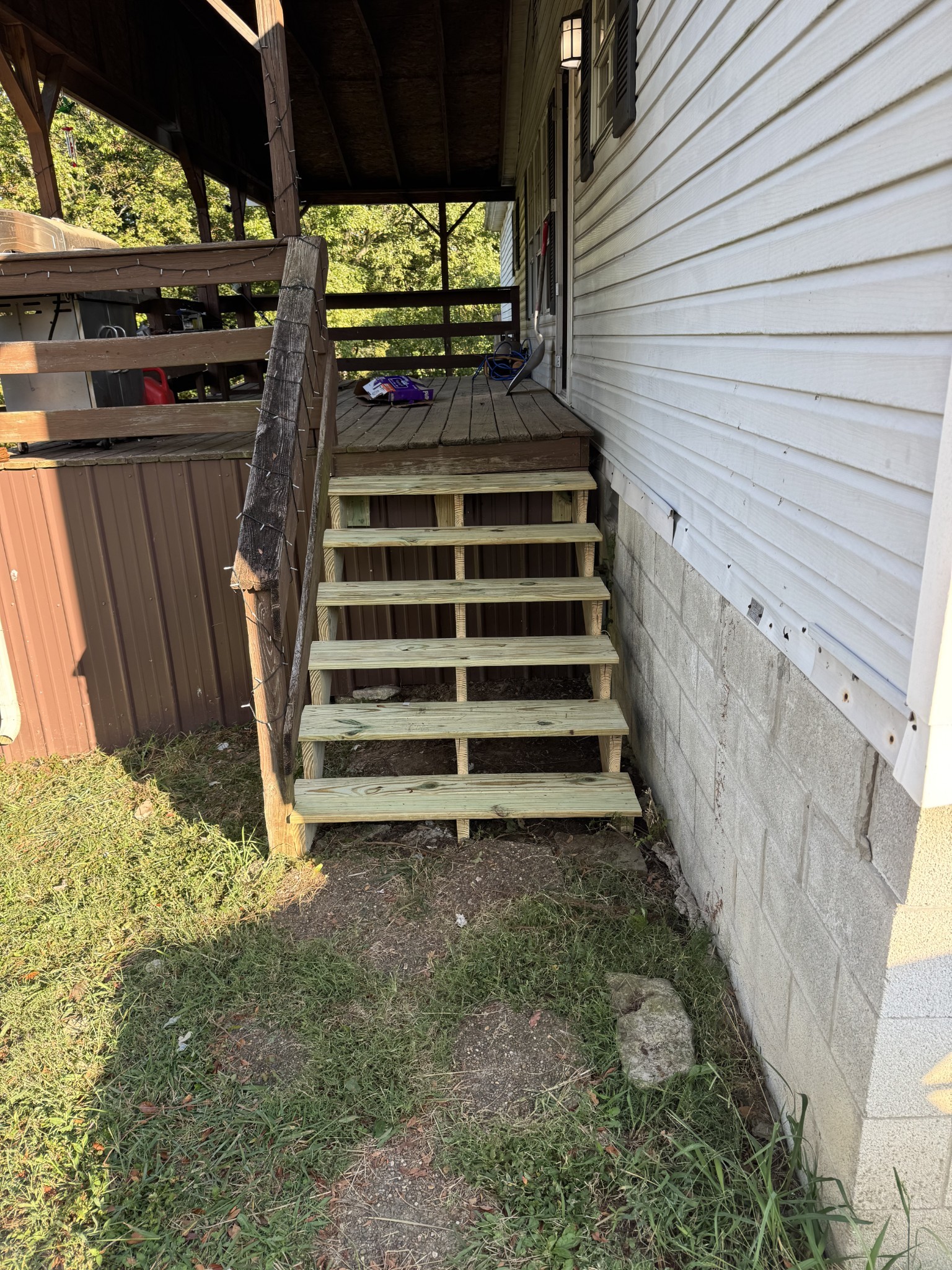 225 Opossum Hollow Road Watertown, TN 37184 - Photo 8 of 29 a view of a backyard with stairs