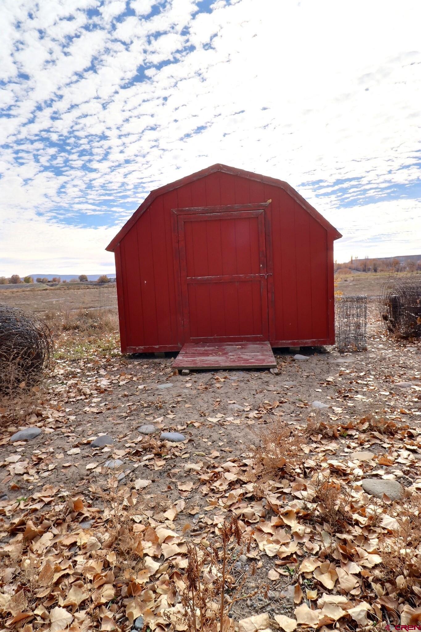 21148 H75 Road Delta, CO 81416 - Photo 11 of 30 a view of backyard with trampoline
