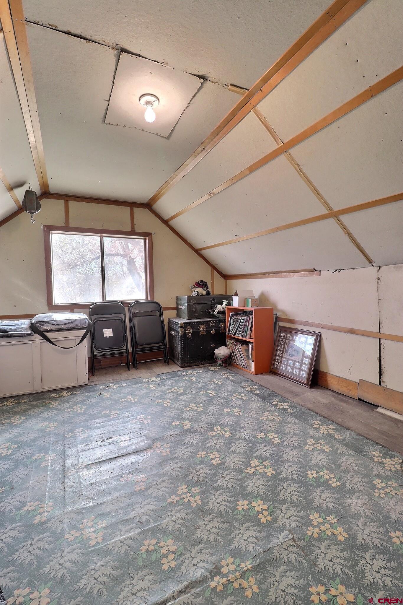 21148 H75 Road Delta, CO 81416 - Photo 23 of 30 a view of a livingroom with furniture and a flat screen tv