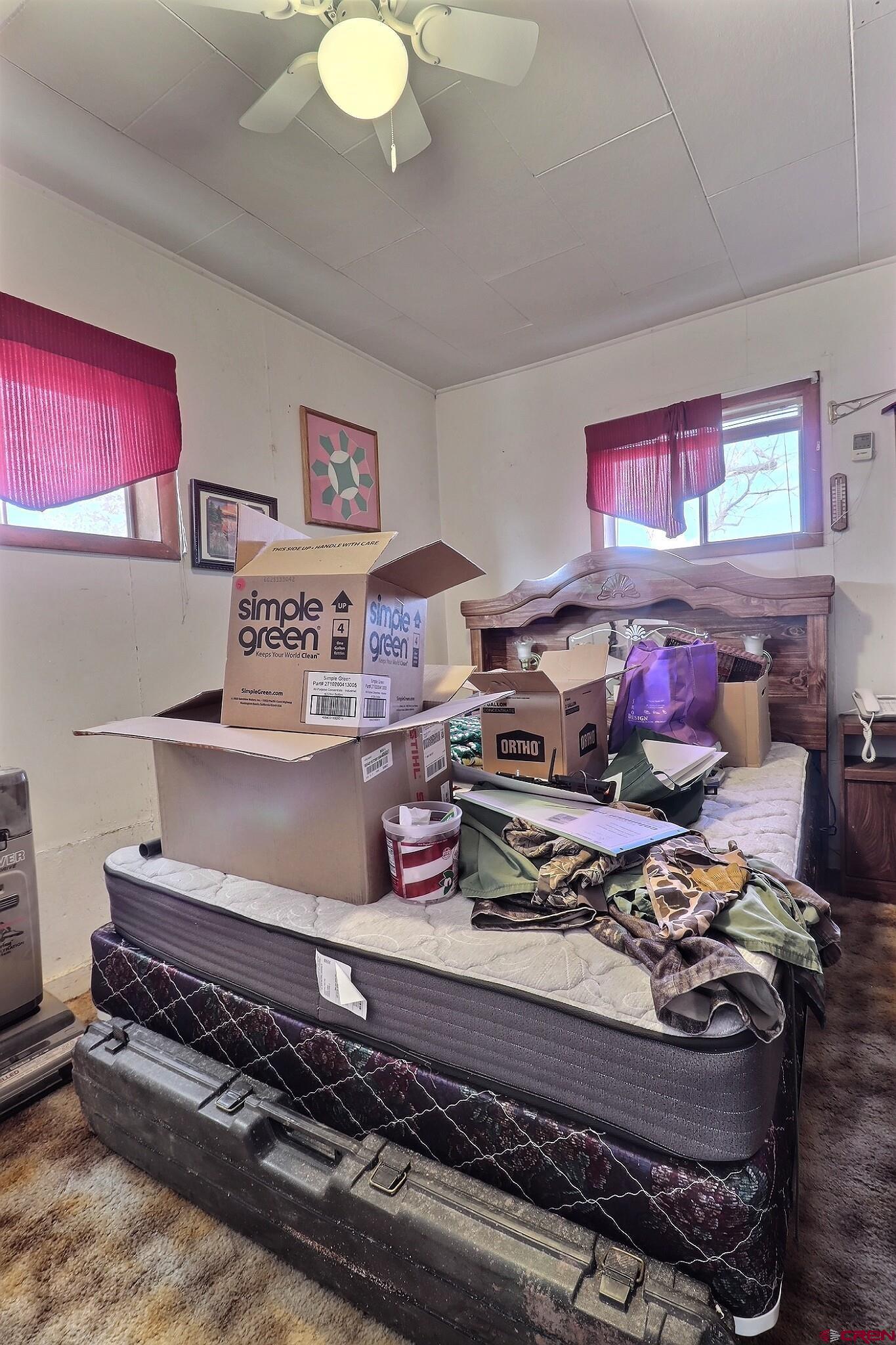 21148 H75 Road Delta, CO 81416 - Photo 28 of 30 a living room with hard wood flooring and white walls
