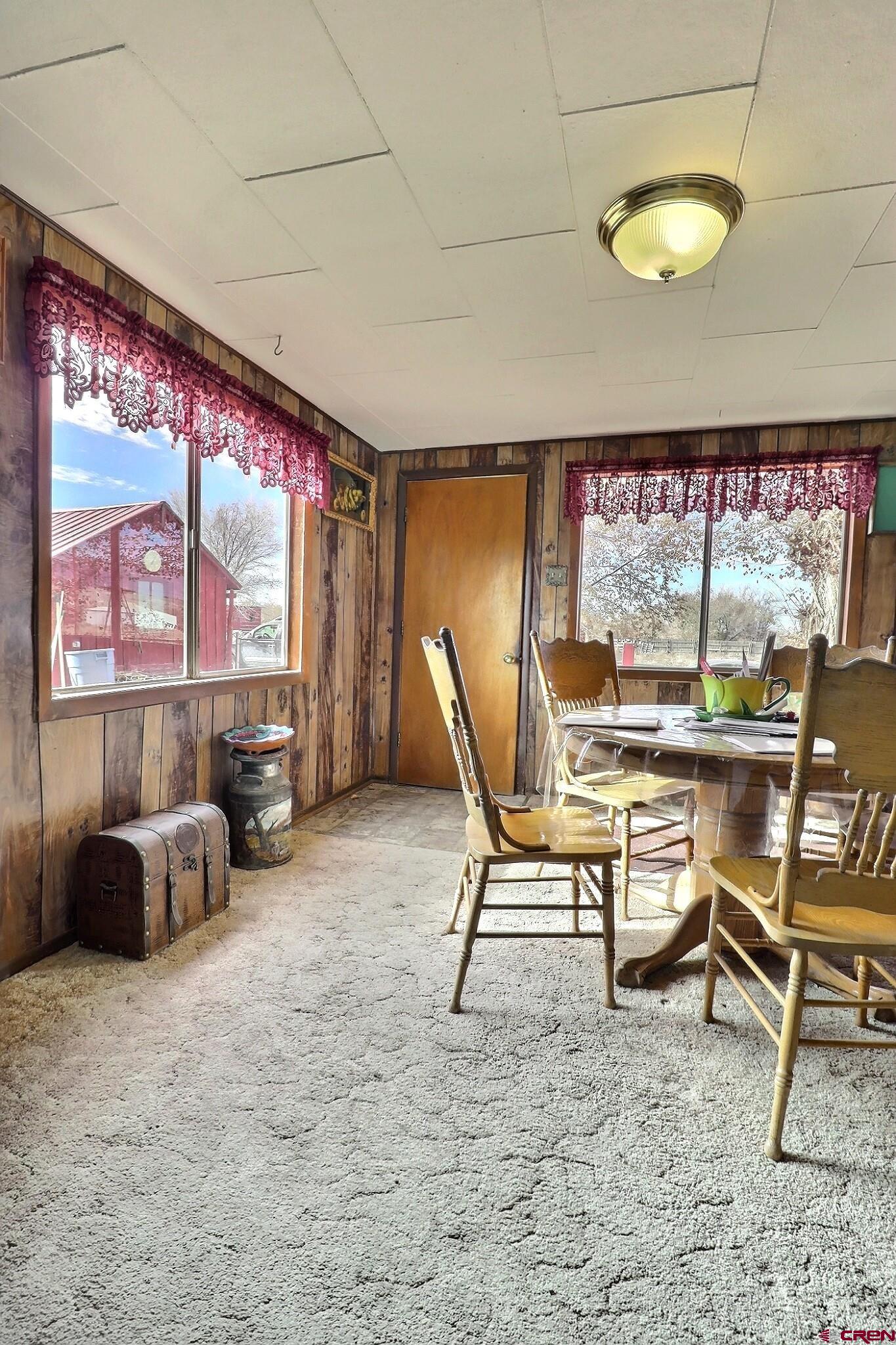 21148 H75 Road Delta, CO 81416 - Photo 5 of 30 a view of a big room with furniture and window
